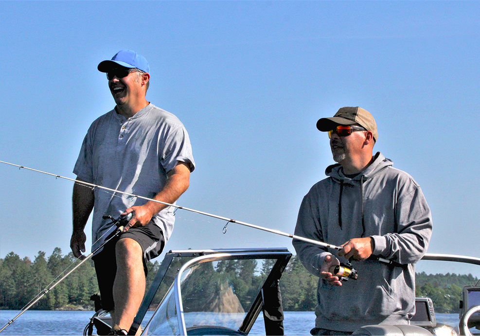 Two people fishing.
