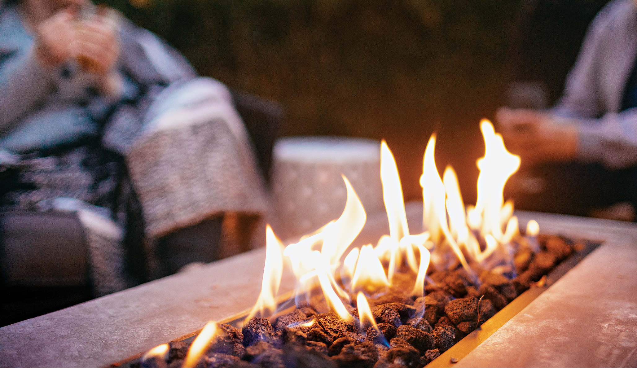 A close-up image of a propane-powered fire pit.