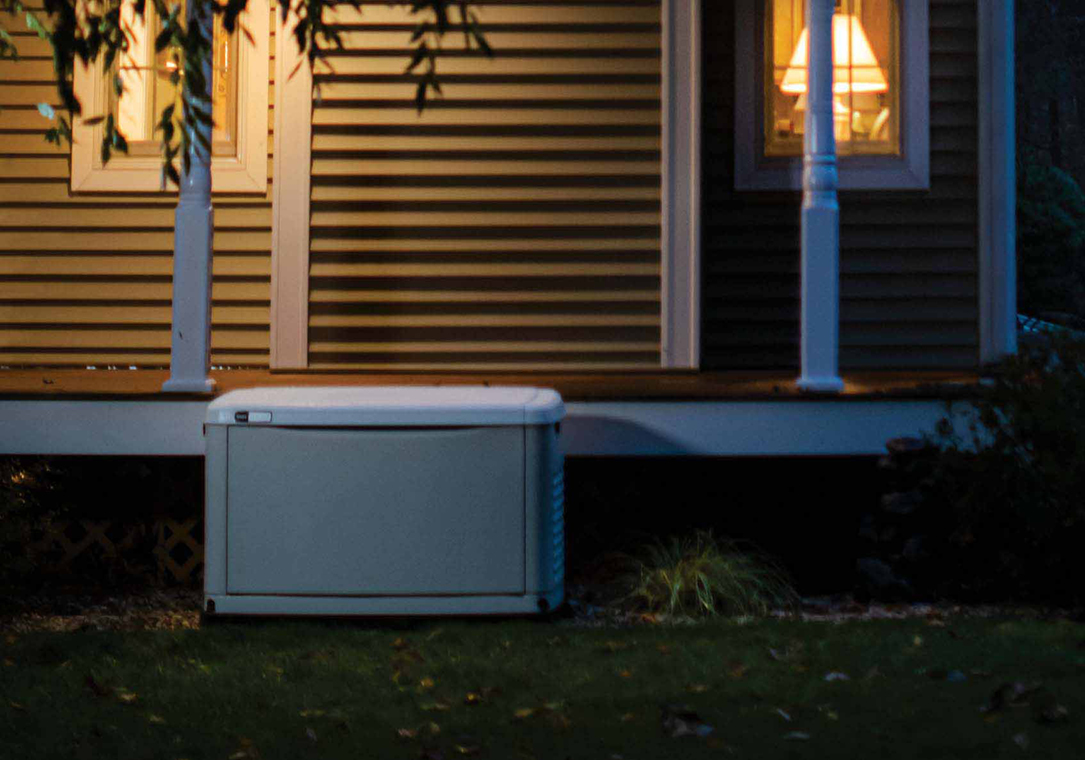 A propane generator sitting outside of a house.