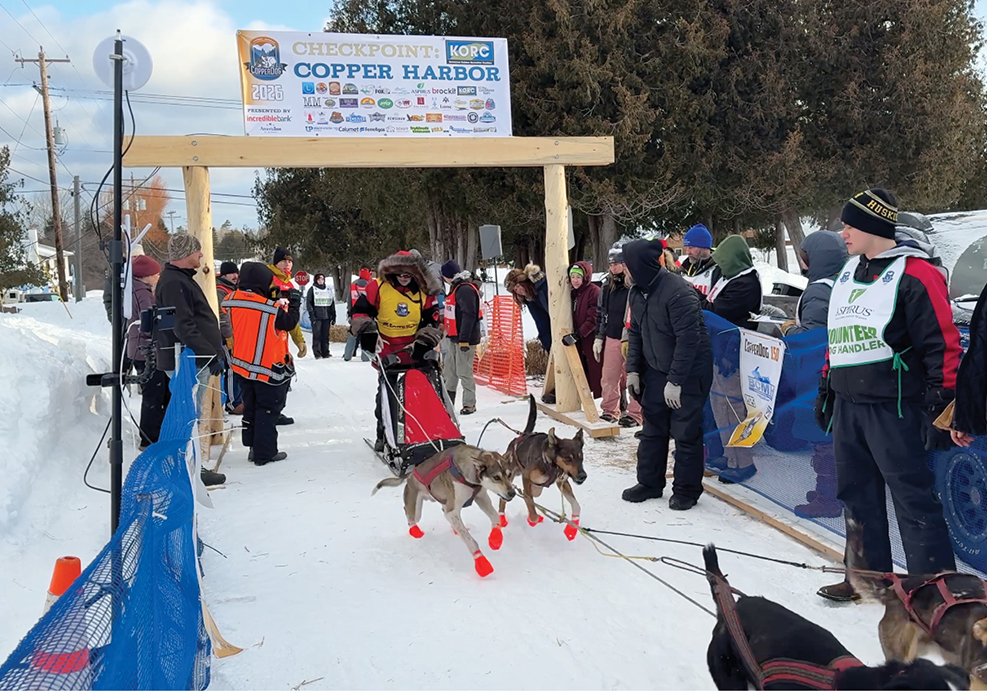 People participate in the CooperDog 150 Sled Dog Race.